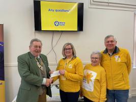 President Keith presenting a cheque to Marie Curie for £250
